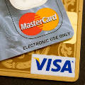 Российские власти смягчили технические требования к Visa и MasterCard